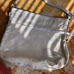 White and silver coach shoulder